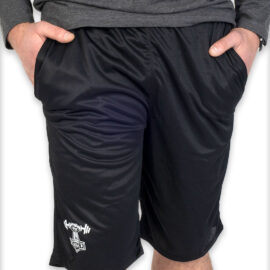 Man is wearing a black Knee length shorts with white bigzig logo